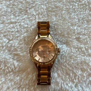 Fossil women’s watch.